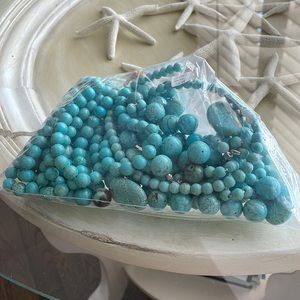 Turquoise colored stone beads for jewelry making. total weight is 2 pounds